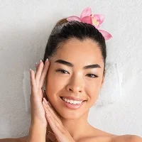 beautiful asian woman lying on massage